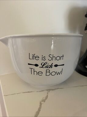 Cost Plus World Market White Ceramic Bowl with Black Logo